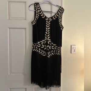 Elegant Black and Gold Sequined Fringe Dress